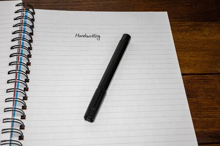 Handwriting text on page of office agenda, office spiral notebook. Copy space.の写真素材