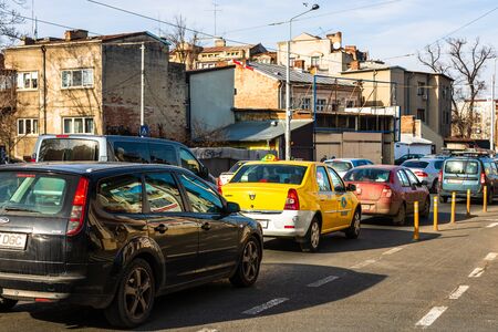 Car traffic at rush hour in downtown area. Bucharest, Romania, 2020.のeditorial素材