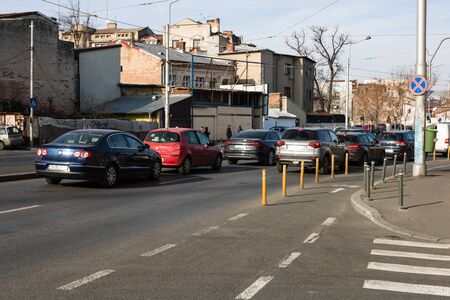 Car traffic at rush hour in downtown area. Bucharest, Romania, 2020.のeditorial素材