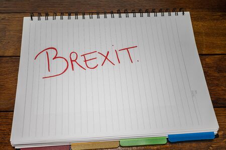 Brexit (January 31, 2020) handwriting  text on paper, political message. Political text on office agenda. Concept of democracy, voting, politics. Copy space.の写真素材