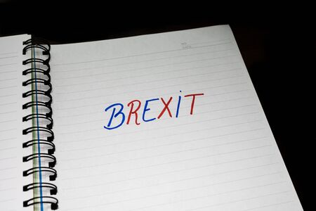 Brexit (January 31, 2020) handwriting  text on paper, political message. Political text on office agenda. Concept of democracy, voting, politics. Copy space.の写真素材