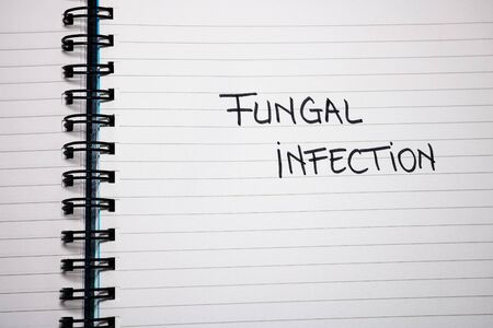 Fungal infection handwriting  text on paper, on office agenda. Copy space.の写真素材