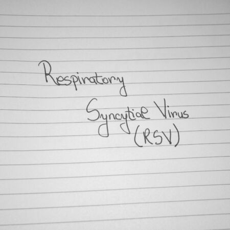 Respiratory Syncytial Virus RSV handwriting  text on paper, on office agenda. Copy space.の写真素材