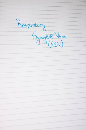 Respiratory Syncytial Virus RSV handwriting  text on paper, on office agenda. Copy space.の写真素材