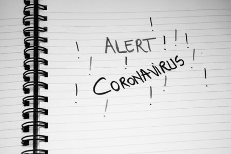 Coronavirus test handwriting  text on paper, on office agenda. Copy space.の写真素材