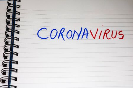 Coronavirus test handwriting  text on paper, on office agenda. Copy space.の写真素材