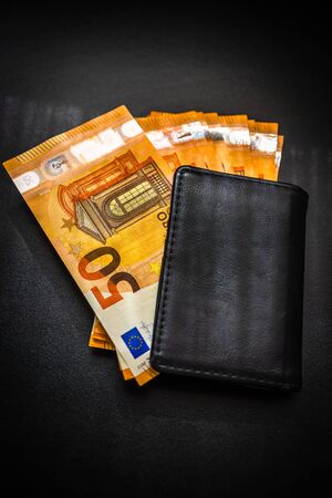 Man wallet with money on the table, wallet with EUROのeditorial素材