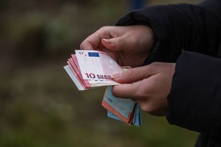 Woman counting money, counting EURO close upのeditorial素材