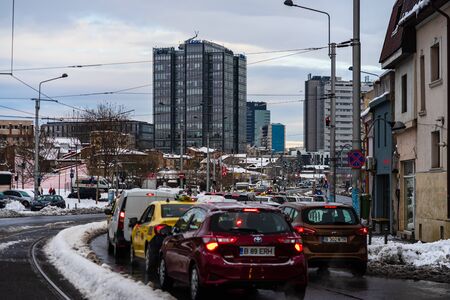 Winter season and icy cars on the road in the morning rush hour traffic in Bucharest, Romania, 2020のeditorial素材