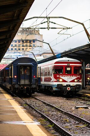 Detail train view. Train on the platform of Bucharest North Railway Station (Gara de Nord Bucuresti) in Bucharest, Romania, 2020のeditorial素材