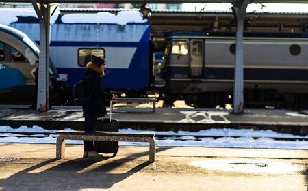Travelers and commuters waiting for a train on the platform of Bucharest North Railway Station (Gara de Nord) in Bucharest, Romania, 2020のeditorial素材