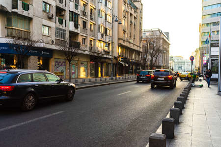 Car traffic at rush hour in downtown area of the city. Car pollution, traffic jam in the morning and evening in the capital city of Bucharest, Romania, 2020のeditorial素材