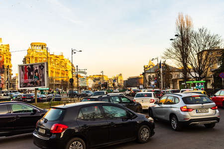 Car traffic at rush hour in downtown area of the city. Car pollution, traffic jam in the morning and evening in the capital city of Bucharest, Romania, 2020のeditorial素材