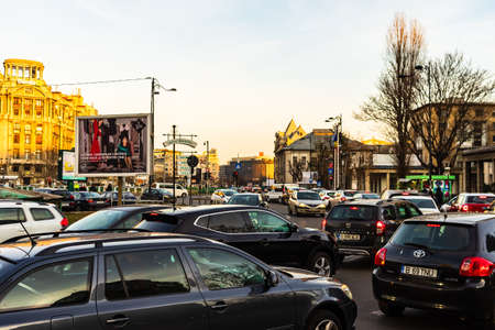 Car traffic at rush hour in downtown area of the city. Car pollution, traffic jam in the morning and evening in the capital city of Bucharest, Romania, 2020のeditorial素材