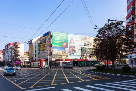 View of buildings, traffic and people in downtown of Targoviste, Romania, 2020.のeditorial素材