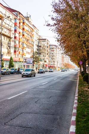 View of buildings, traffic and people in downtown of Targoviste, Romania, 2020.のeditorial素材