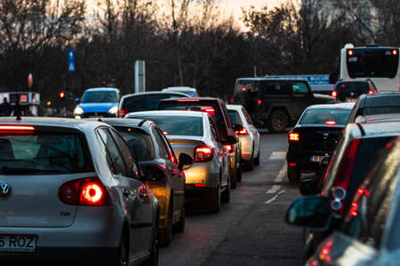 Car traffic at rush hour in downtown area of the city. Car pollution, traffic jam in the morning and evening in the capital city of Bucharest, Romania, 2020のeditorial素材