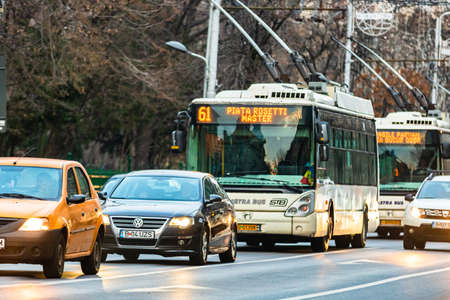 Car traffic at rush hour in downtown area of the city. Car pollution, traffic jam in the morning and evening in the capital city of Bucharest, Romania, 2020のeditorial素材