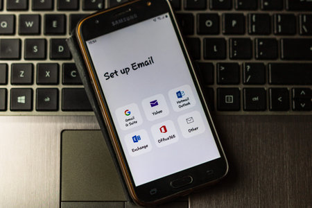 Email application, home menu on smartphone screen pixelated close up view. Bucharest, Romania, 2020.