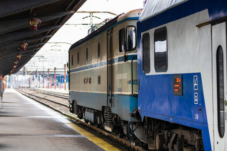 Train stopped at train platform at Bucharest North Railway Station (Gara de Nord Bucharest) in...