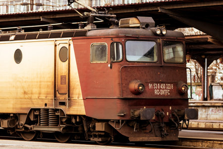 Train stopped at train platform at Bucharest North Railway Station (Gara de Nord Bucharest) in...