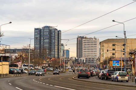Car traffic at rush hour in downtown area of the city. Car pollution, traffic jam in the morning and evening in the capital city of Bucharest, Romania, 2020のeditorial素材