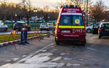 Romanian SMURD ambulance car, 911 or 112 emergency medical service in mission in downtown Bucharest,...