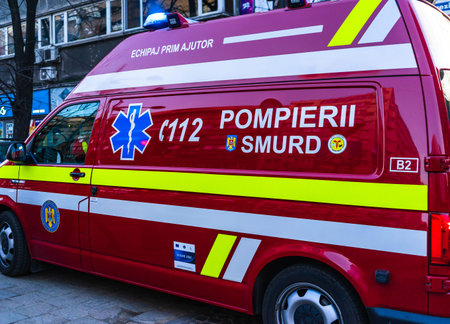 Romanian SMURD ambulance car, 911 or 112 emergency medical service in mission in downtown Bucharest,...