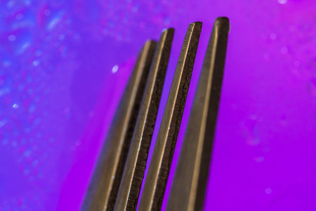 Abstract fork detail on colorful surface. Abstract background concept