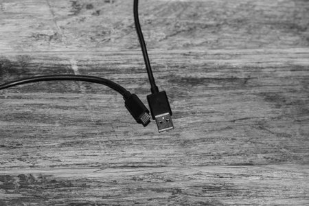 Close up of black USB cable isolated, cable USB connection.