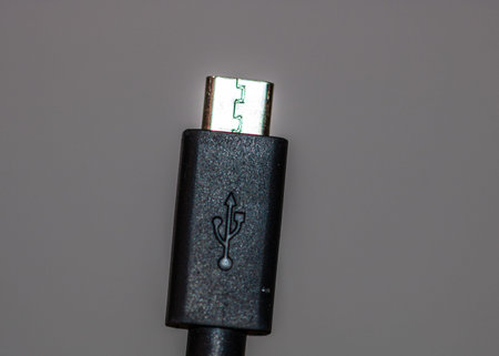 Close up of black USB cable isolated, cable USB connection.