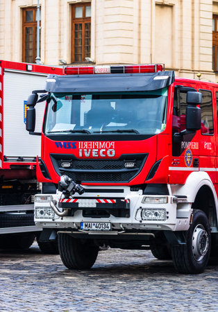 Romanian Firefighting emergency firemen (Pompierii) parked in front of the Home Office (Ministry of...
