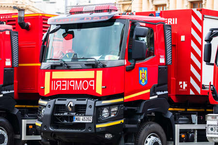 Romanian Firefighting emergency firemen (Pompierii) parked in front of the Home Office (Ministry of the Interior) in Bucharest, Romania, 2020. Coronavirus worldwide outbreak crisis. Spread of the COVID-19 virusのeditorial素材