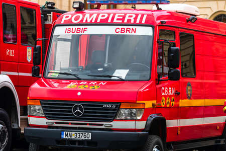 Romanian Firefighting emergency firemen (Pompierii) parked in front of the Home Office (Ministry of the Interior) in Bucharest, Romania, 2020. Coronavirus worldwide outbreak crisis. Spread of the COVID-19 virusのeditorial素材