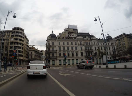 Changes and complications caused by coronavirus epidemy, world without crowds, virus empties streets. No traffic jam, no pollution, empty streets in downtown Bucharest, Romania, 2020のeditorial素材