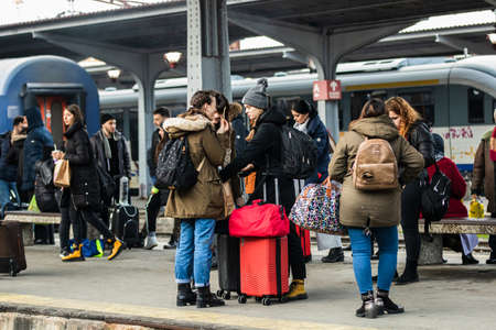 Travelers and commuters waiting for a train on the train platform of Bucharest North Railway Station (Gara de Nord Bucharest) in Bucharest, Romania, 2020のeditorial素材