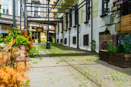 Empty tables at local restaurants in Old Town Bucharest due to coronavirus worldwide outbreak crisis. Deserted downtown, bar district in Bucharest, Romania, 2020のeditorial素材