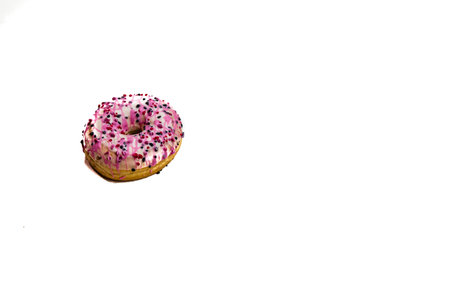 Colorful donut isolated on white. Sweet icing sugar food with glazed sprinkles, doughnut with...