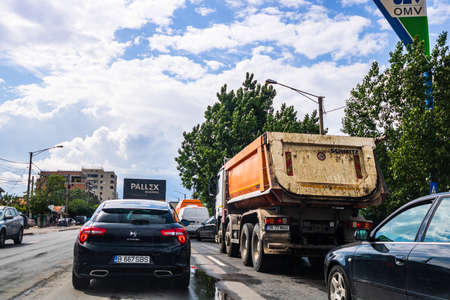 Traffic in cloudy rainy day with road view through car front window in Bucharest, Romania, 2020のeditorial素材