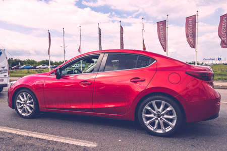 Traffic with road view through car front window, Red mazda 3 car in traffic. Bucharest, Romania, 2020のeditorial素材