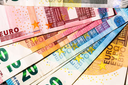 Close up of money euro banknotes, background of money euro isolated.の写真素材