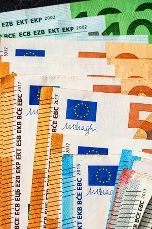 Close up of money euro banknotes, background of money euro isolated.