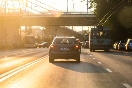 Car traffic at rush hour in downtown area. Traffic jam, cars on the road at sunset in Bucharest, Romania, 2020のeditorial素材