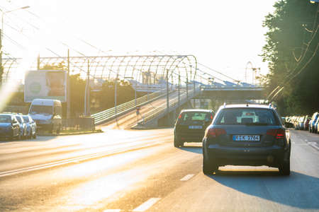 Car traffic at rush hour in downtown area. Traffic jam, cars on the road at sunset in Bucharest, Romania, 2020のeditorial素材