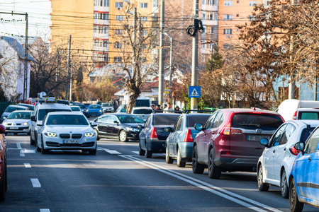 Cars in traffic car traffic at rush hour in downtown area of Targoviste, Romania, 2020