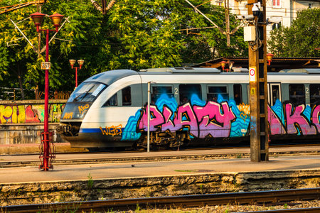 Detail of train in motion at train platform at Bucharest North Railway Station (Gara de Nord...