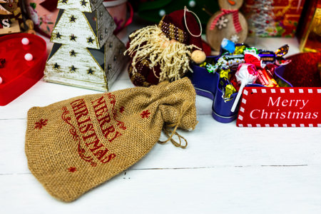 Christmas ornaments decorations and gifts under the  Christmas tree.