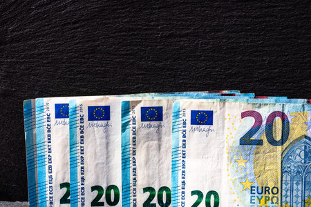 Selective focus on detail of euro banknotes. Close up macro detail of money banknotes, 20 euro...