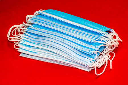 Close up and detail of medical hygienic mask, face protective surgical masks isolated.の写真素材