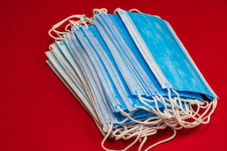 Close up and detail of medical hygienic mask, face protective surgical masks isolated.
